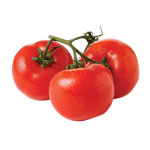 three red tomatoes on a vine