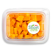 Cubed butternut squash in a plastic container
