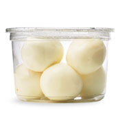 Hard-boiled eggs in a container that have been peeled