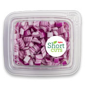 Diced up red onions in a plastic container